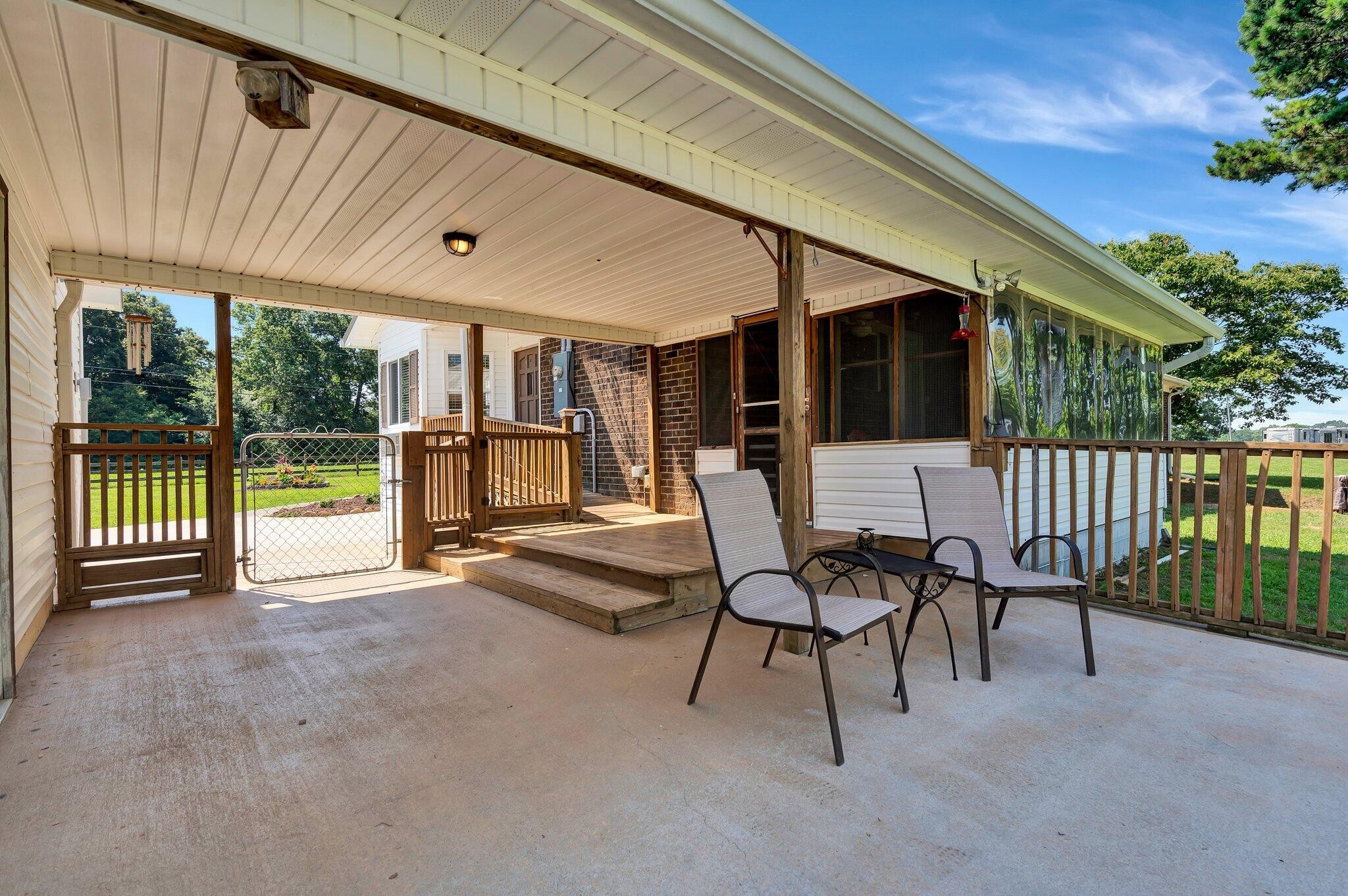 470 Armstrong Road Southeast Cleveland, TN 37323 - Photo 42 of 57 a view of patio with a table and chairs and a barbeque