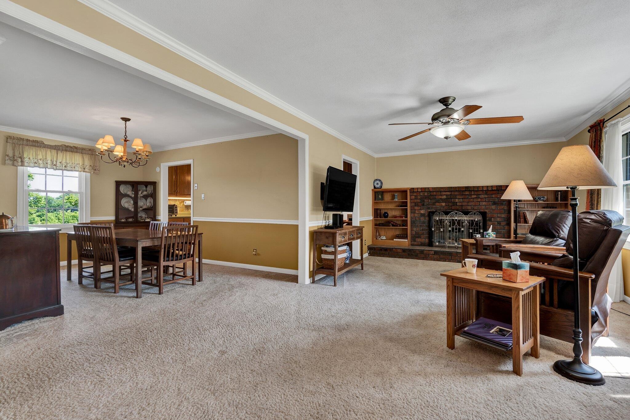 470 Armstrong Road Southeast Cleveland, TN 37323 - Photo 10 of 57 a view of a livingroom with furniture and a ceiling fan