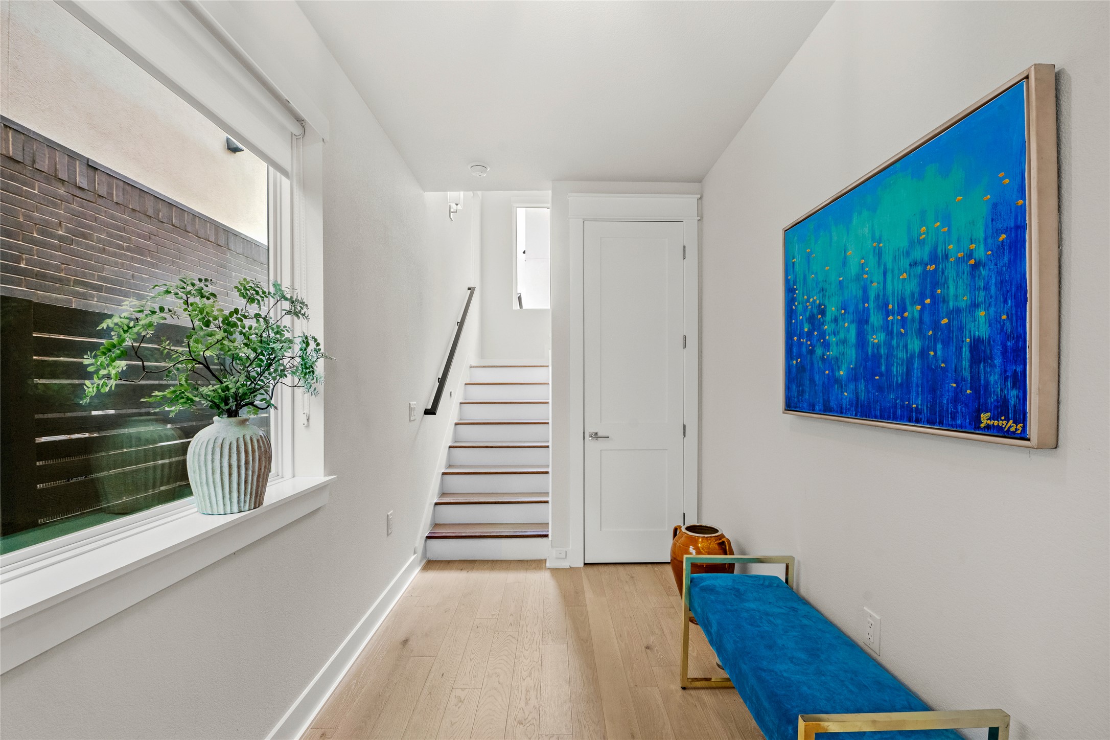 5002 Pecan Springs Road, Unit 8 Austin, TX 78723 - Photo 11 of 35 Bright Entryway with Wood Flooring