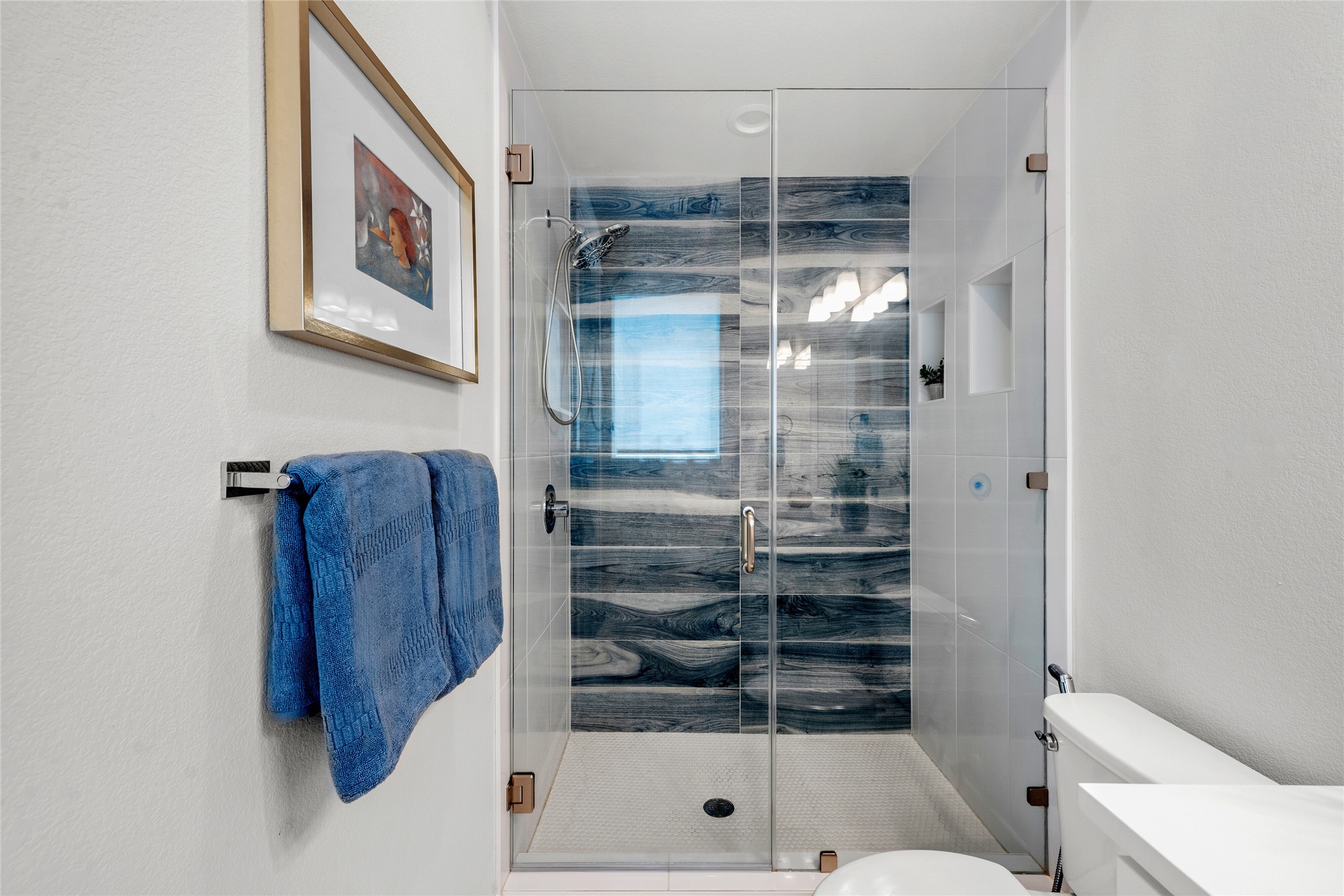 5002 Pecan Springs Road, Unit 8 Austin, TX 78723 - Photo 22 of 35 Main Floor Bathroom with Designer Custom Tiled Shower