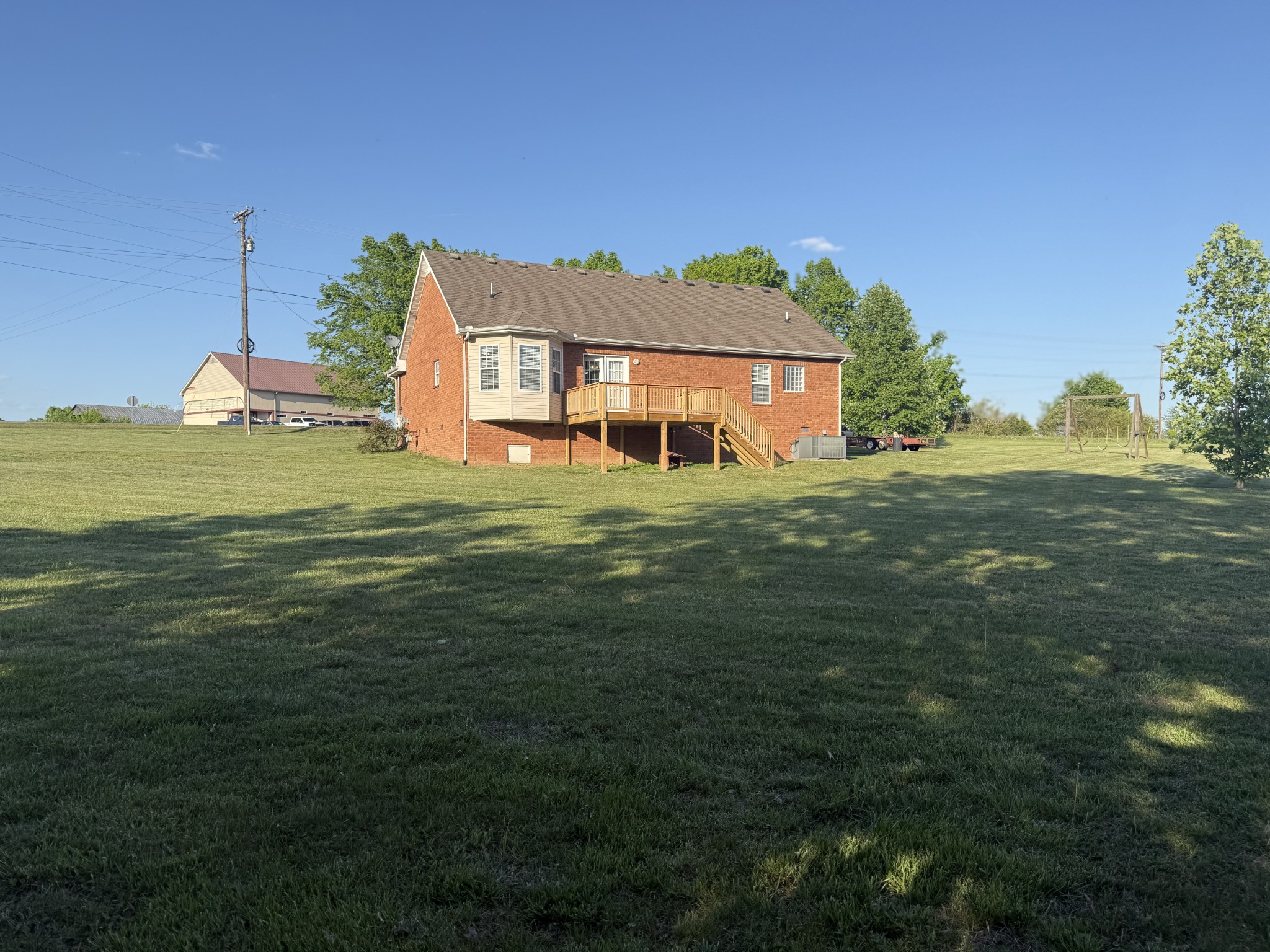 1702 Abiff Road Burns, TN 37029 - Photo 15 of 47 a view of a house with a big yard