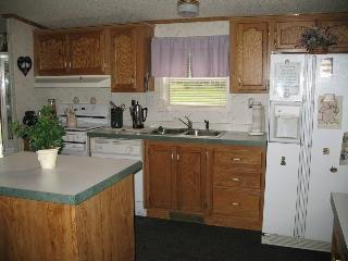 346 Rr 2 (rittenhouse) Clinton, IL 61727 - Photo 3 of 7 a kitchen with sink a window and cabinets