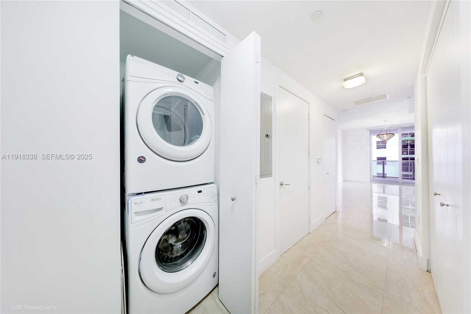 488 Northeast 18th Street, Unit 2304 Miami, FL 33132 - Photo 4 of 41 a utility room with dryer and washer
