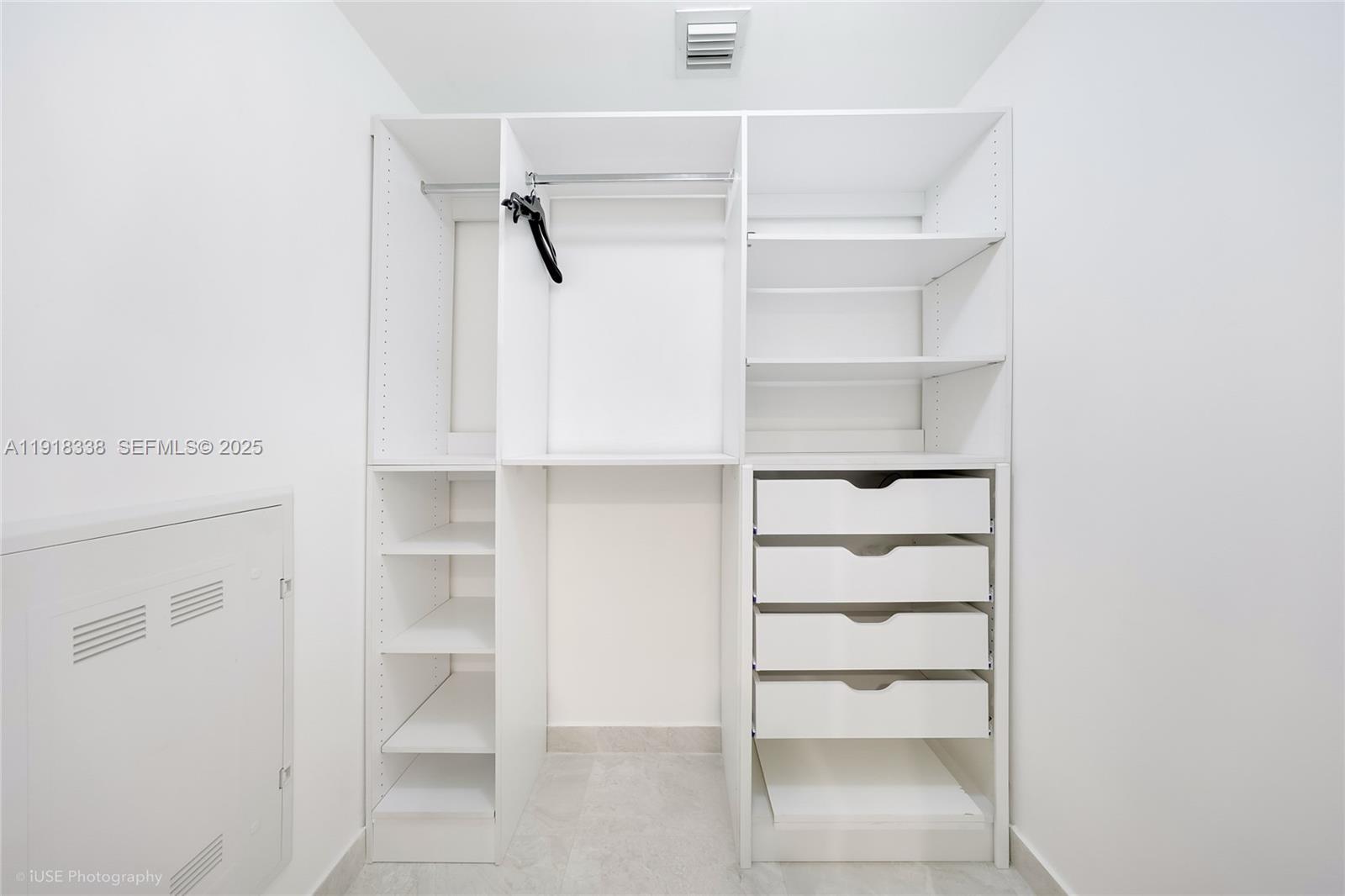 488 Northeast 18th Street, Unit 2304 Miami, FL 33132 - Photo 10 of 41 a view of an empty walk in closet