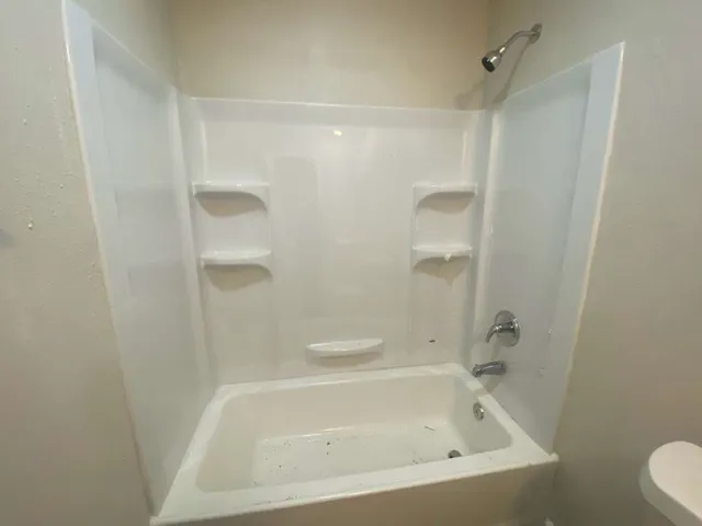 a bathroom with a bathtub