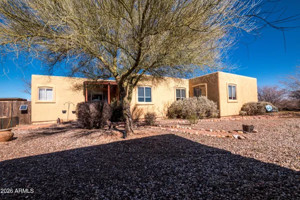 a view of a house with snow on the floor