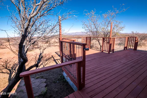a view of backyard with deck