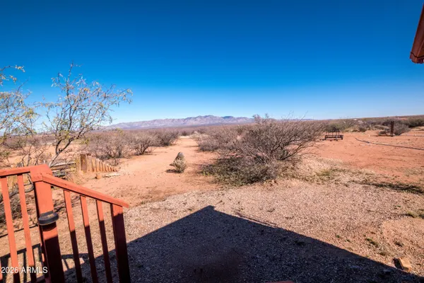 a bath room with a bed and furniture