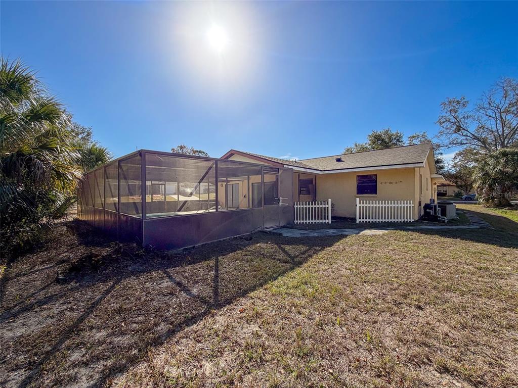 7410 Dundee Court Weeki Wachee, FL 34613 - Photo 33 of 33 a view of house with a yard