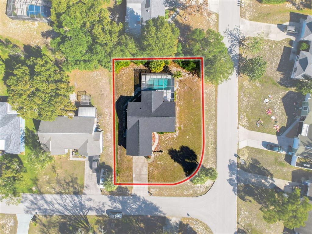 7410 Dundee Court Weeki Wachee, FL 34613 - Photo 8 of 33 an aerial view of a house with swimming pool