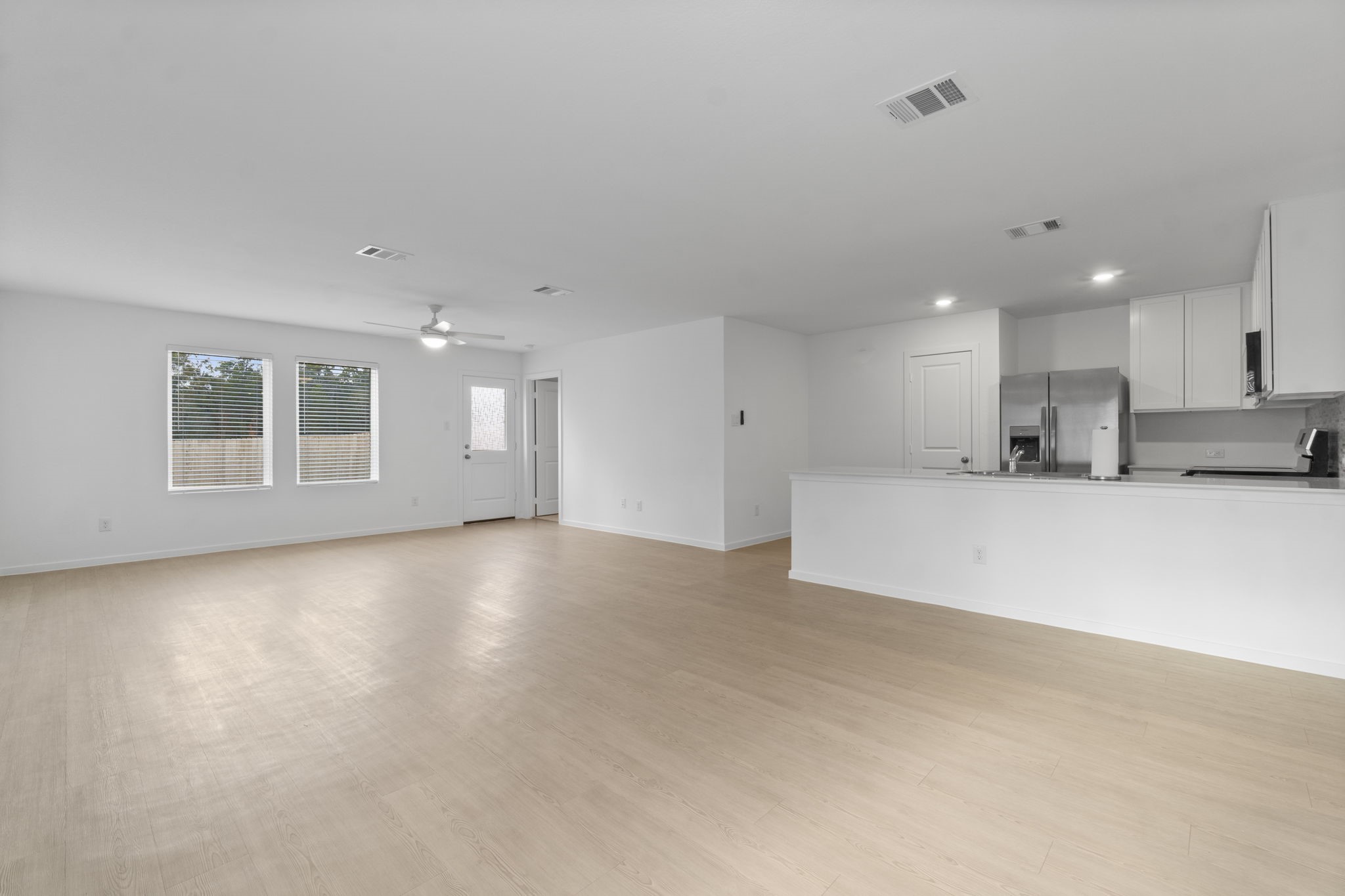 16031 Tallis Drive Conroe, TX 77303 - Photo 15 of 46 a view of an empty room with a window