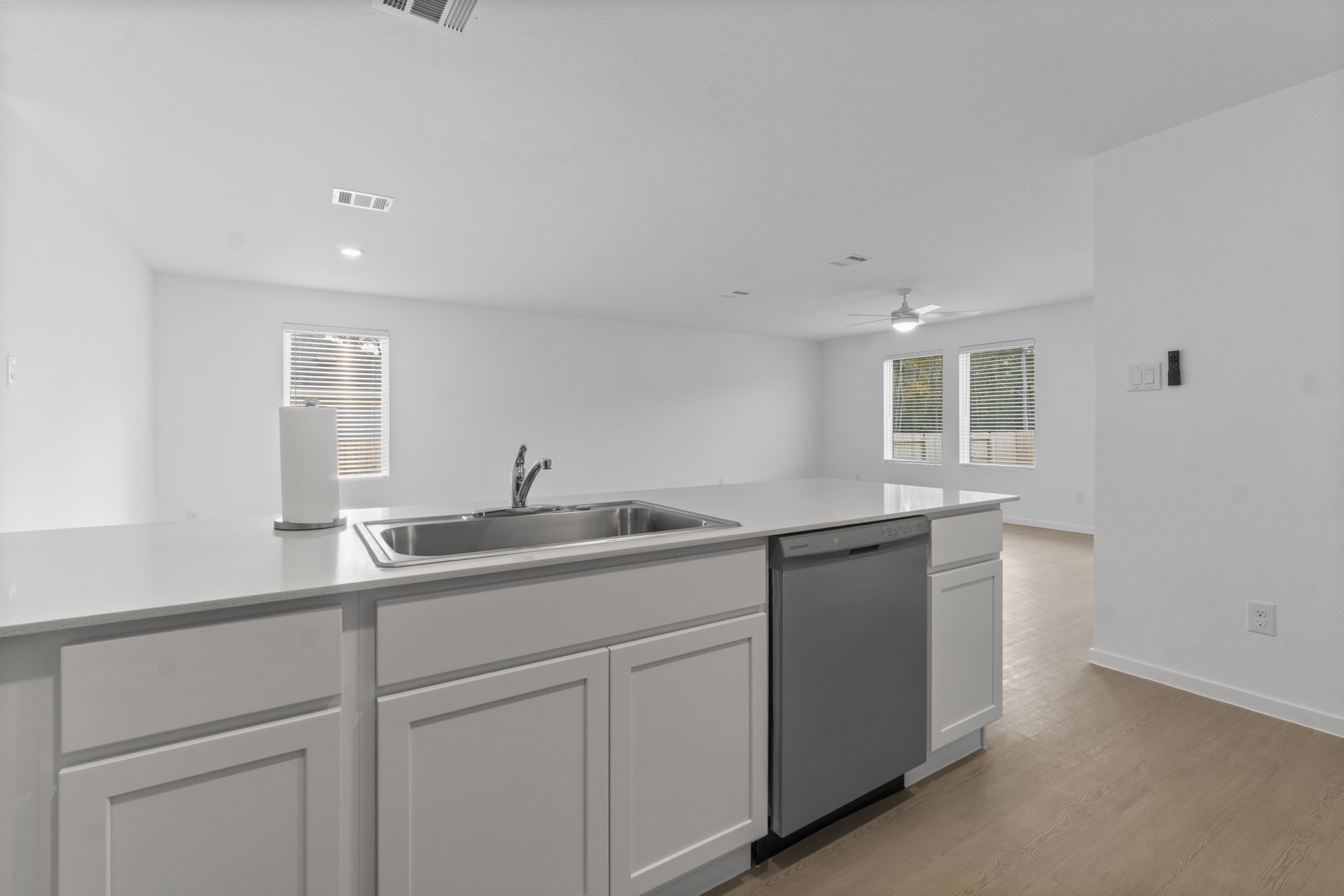 16031 Tallis Drive Conroe, TX 77303 - Photo 21 of 46 a kitchen with a sink and cabinets