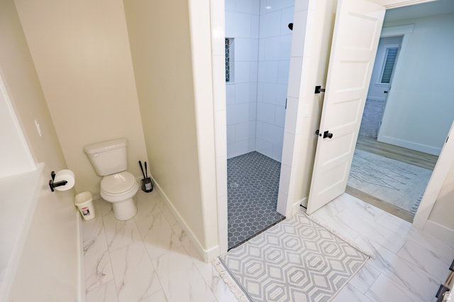 126 North 800 West Mapleton, UT 84664 - Photo 57 of 79 Bathroom featuring light marble finish flooring and walk in shower