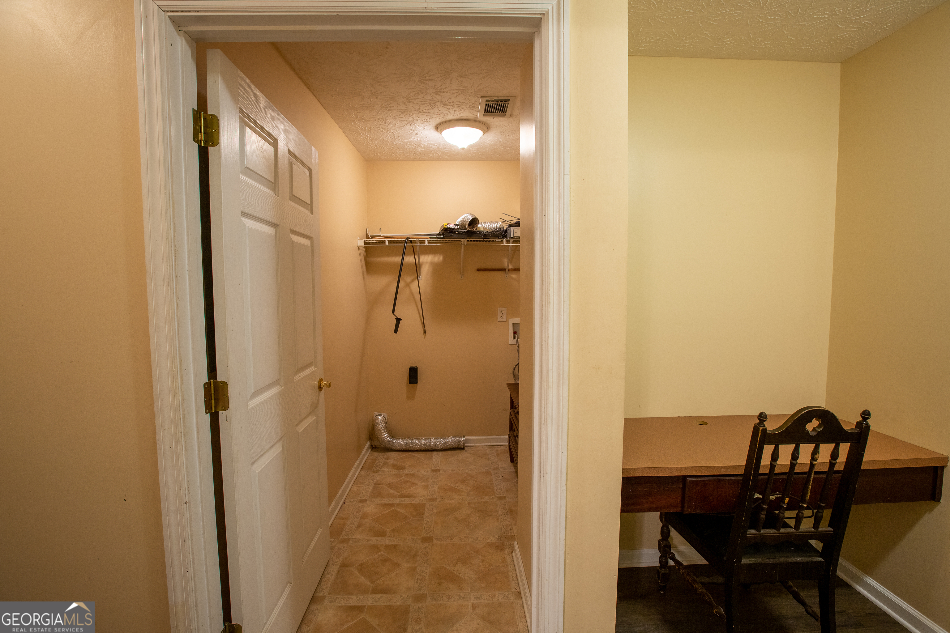 2801 8th Street Columbus, GA 31906 - Photo 12 of 20 a view of a bathroom with a sink and a mirror