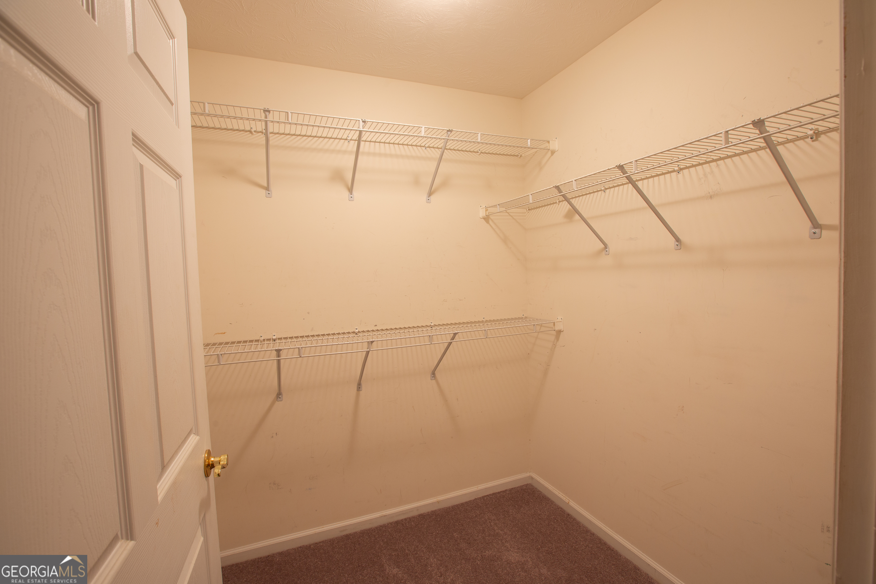 2801 8th Street Columbus, GA 31906 - Photo 19 of 20 a view of a room with racks on the wall