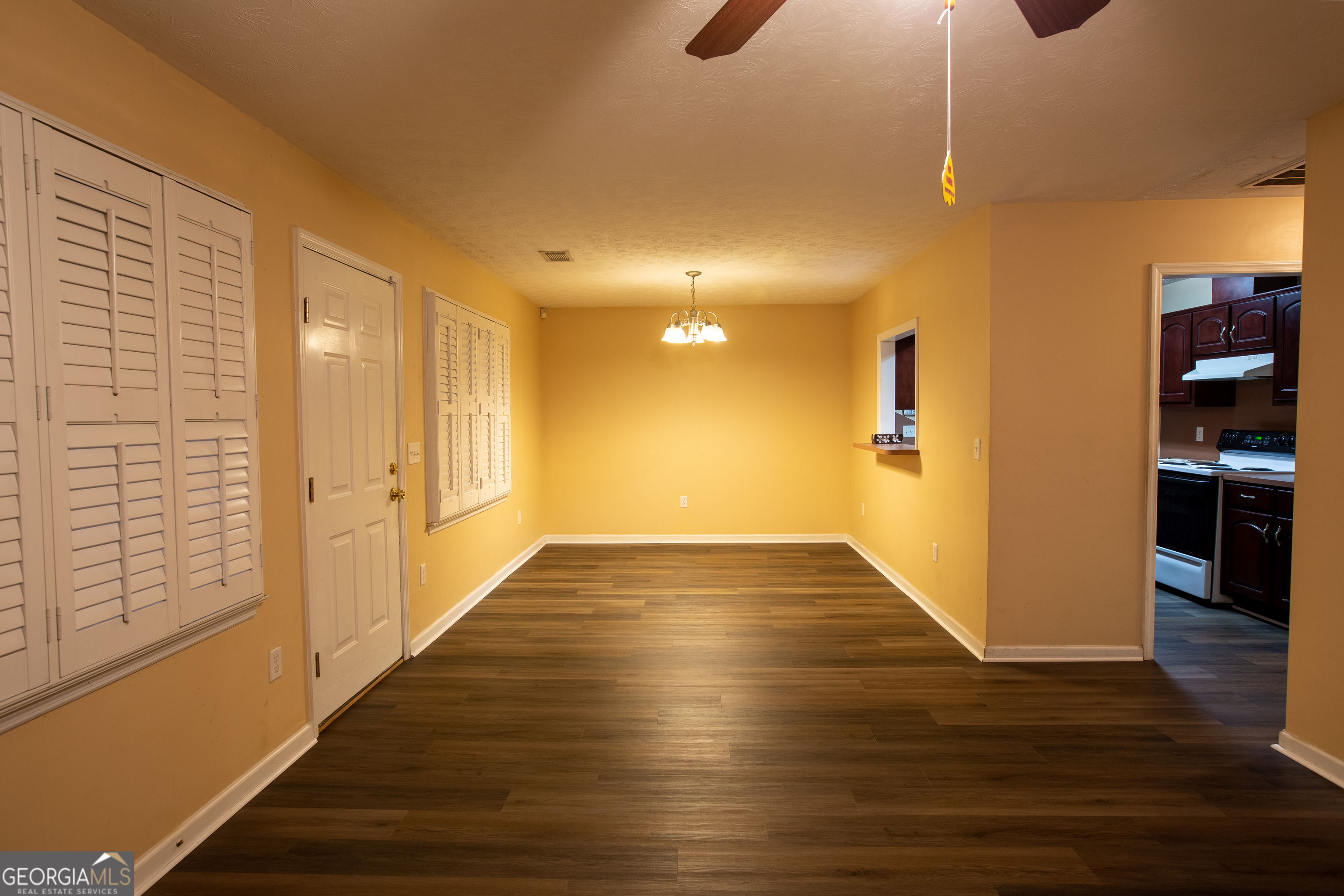 2801 8th Street Columbus, GA 31906 - Photo 4 of 20 a view of a hallway with wooden floor