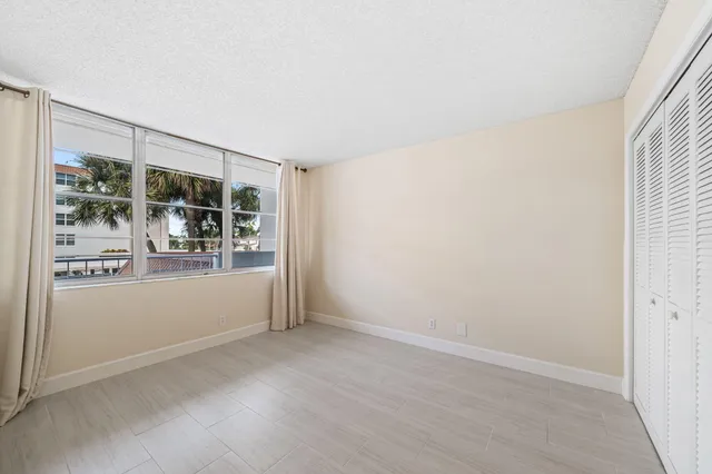 an empty room with window