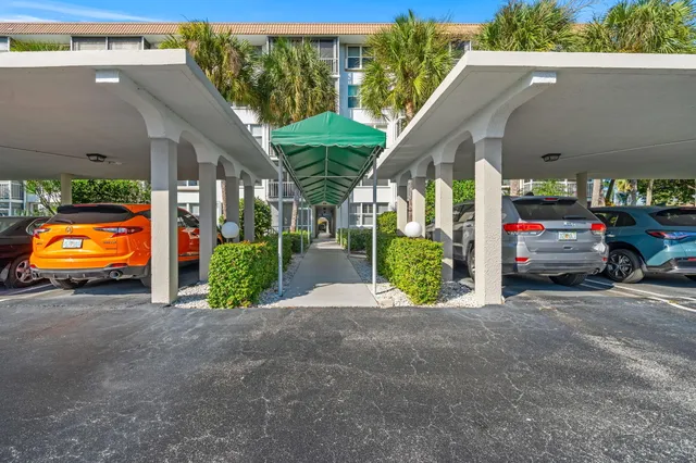 a view of a car park in front of a building