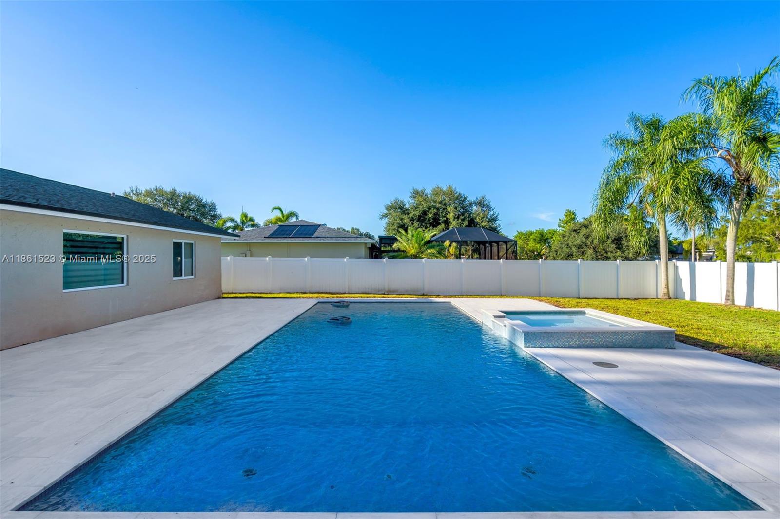 1120 Southwest 128th Drive Davie, FL 33325 - Photo 26 of 38 a view of swimming pool with outdoor seating