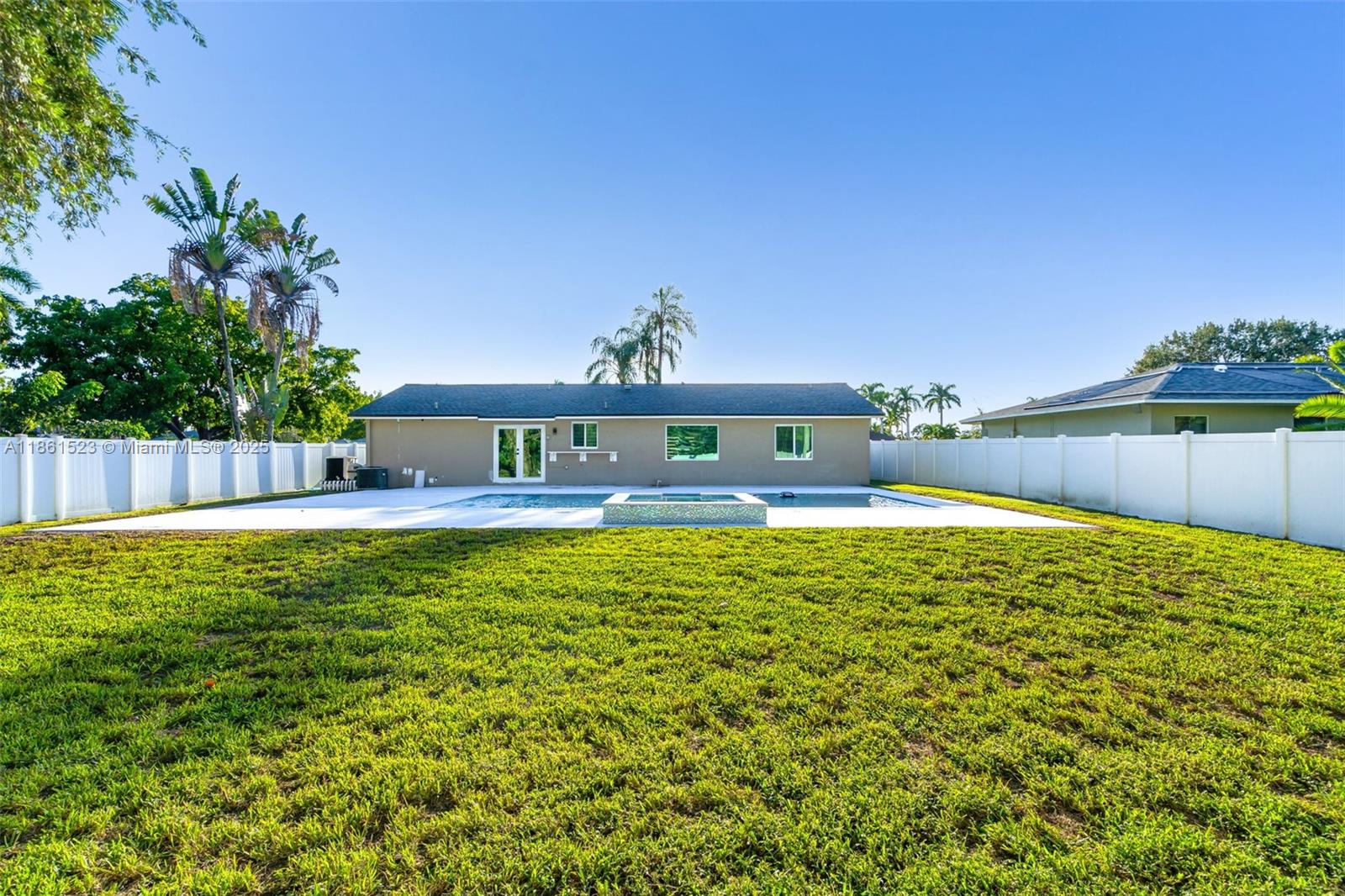 1120 Southwest 128th Drive Davie, FL 33325 - Photo 28 of 38 a view of a swimming pool with a patio