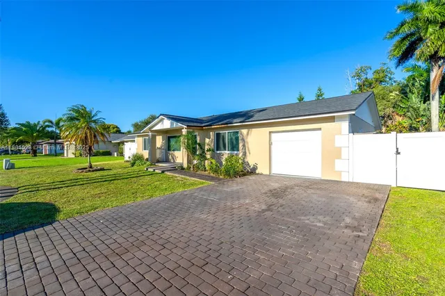 a view of outdoor space and yard