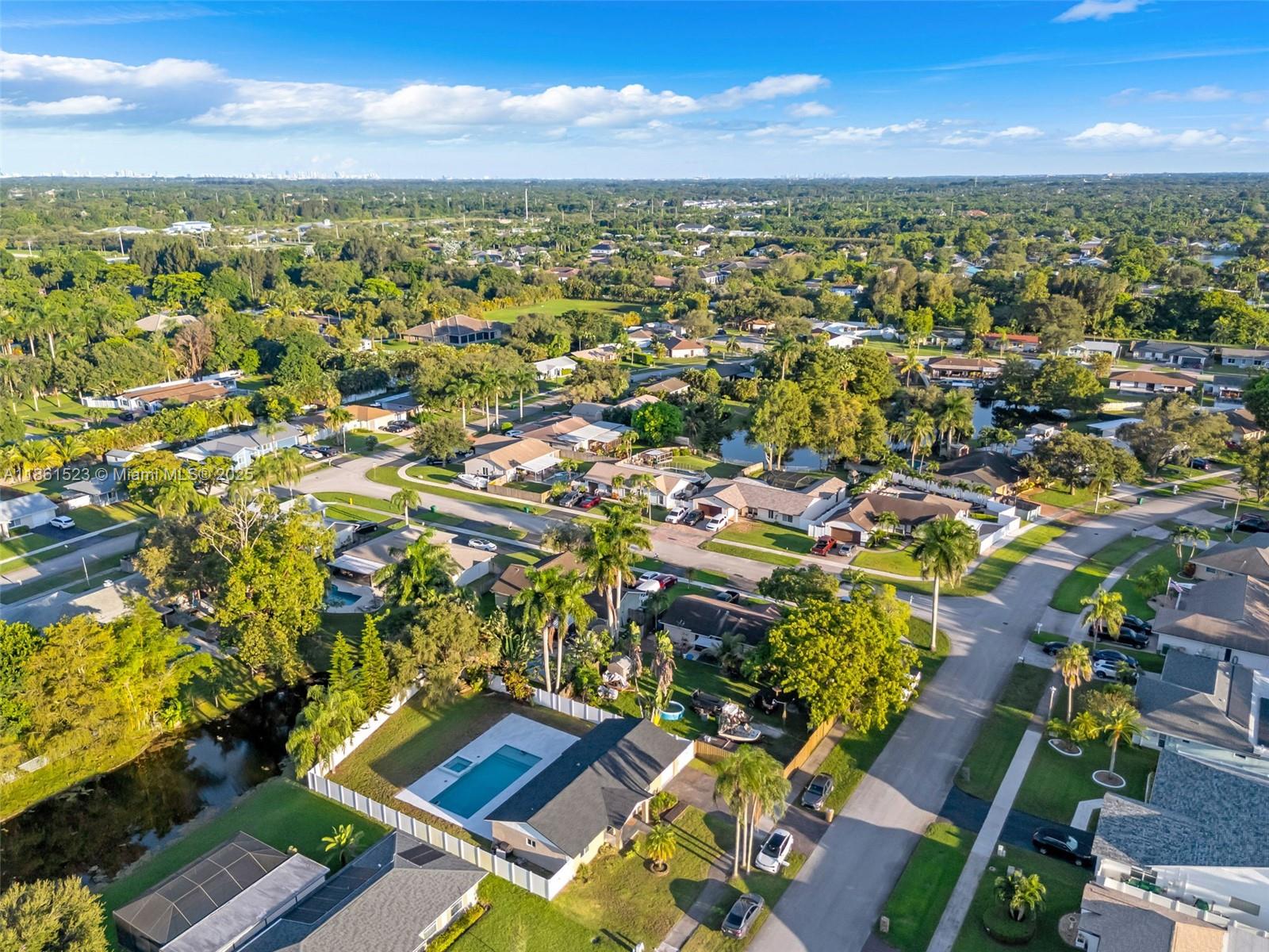 1120 Southwest 128th Drive Davie, FL 33325 - Photo 38 of 38 an aerial view of residential houses with outdoor space and street view