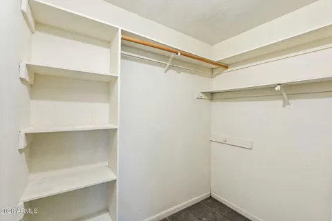 a bathroom with a sink double vanity and a toilet