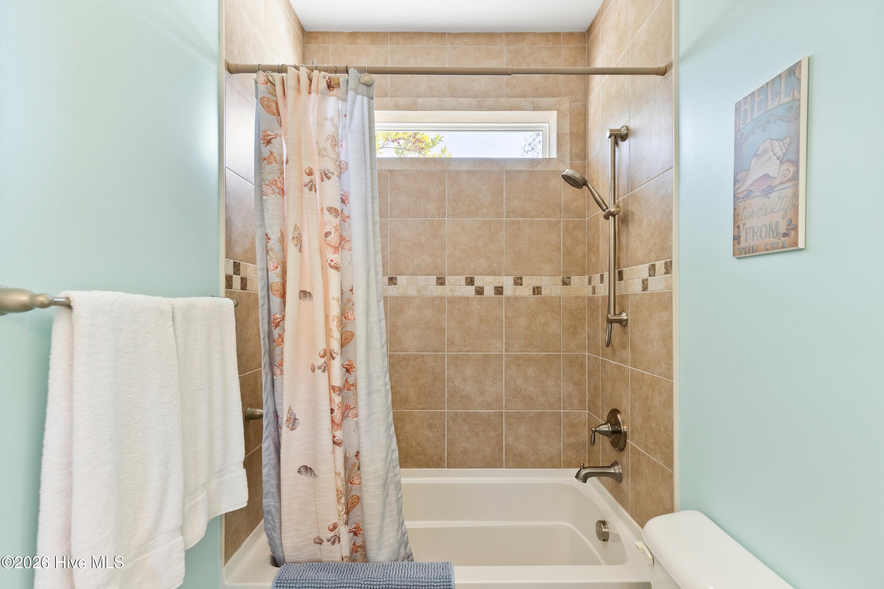 9461 Old Salem Way Calabash, NC 28467 - Photo 29 of 50 Shared bath, tiled to ceiling