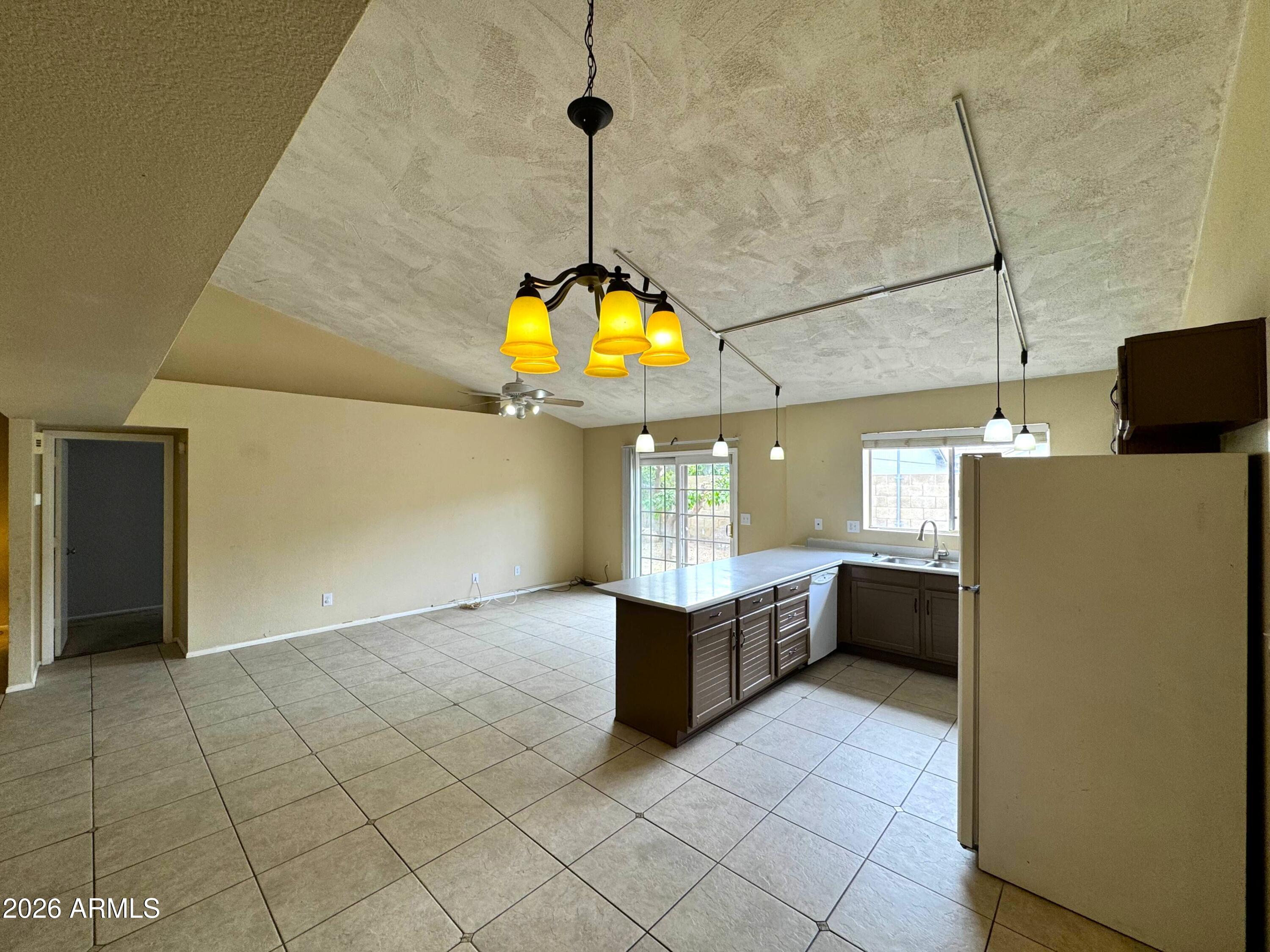 6335 East Brown Road, Unit 1083 Mesa, AZ 85205 - Photo 4 of 15 kitchenliving2FIXED