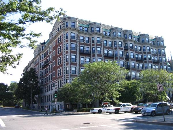 a view of a building and a yard