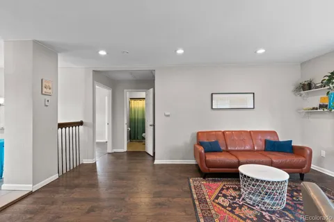 a room with furniture and wooden floor