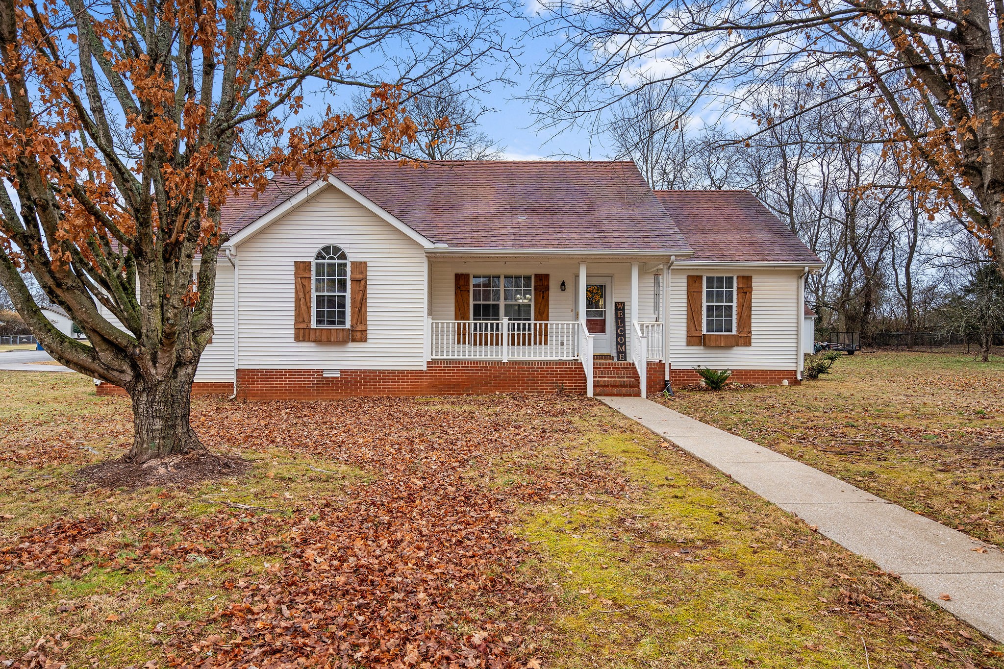 2335 Sawmill Street Murfreesboro, TN 37128 - Photo 2 of 34 front view of a house with a yard