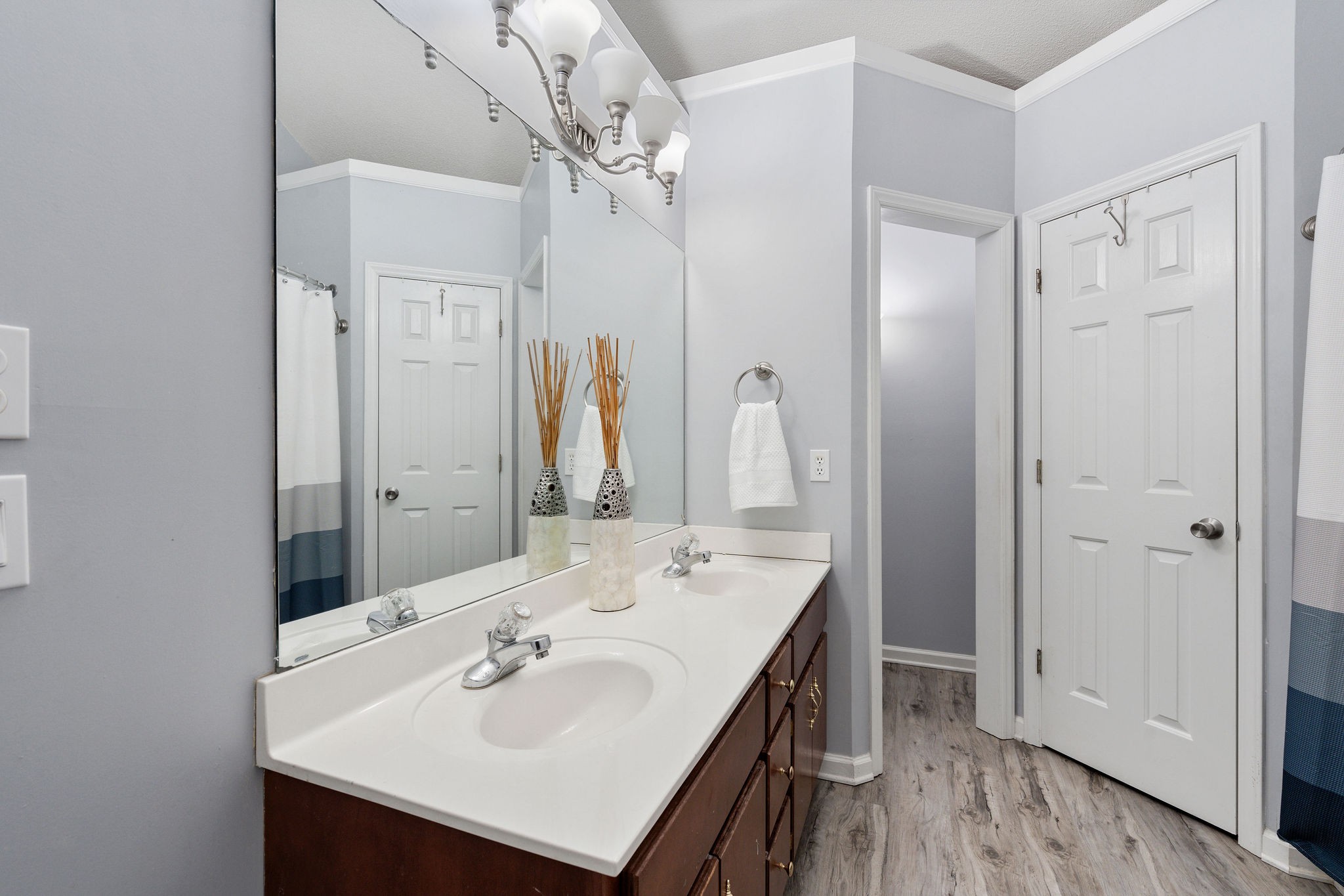2335 Sawmill Street Murfreesboro, TN 37128 - Photo 21 of 34 a bathroom with a sink a mirror and a shower