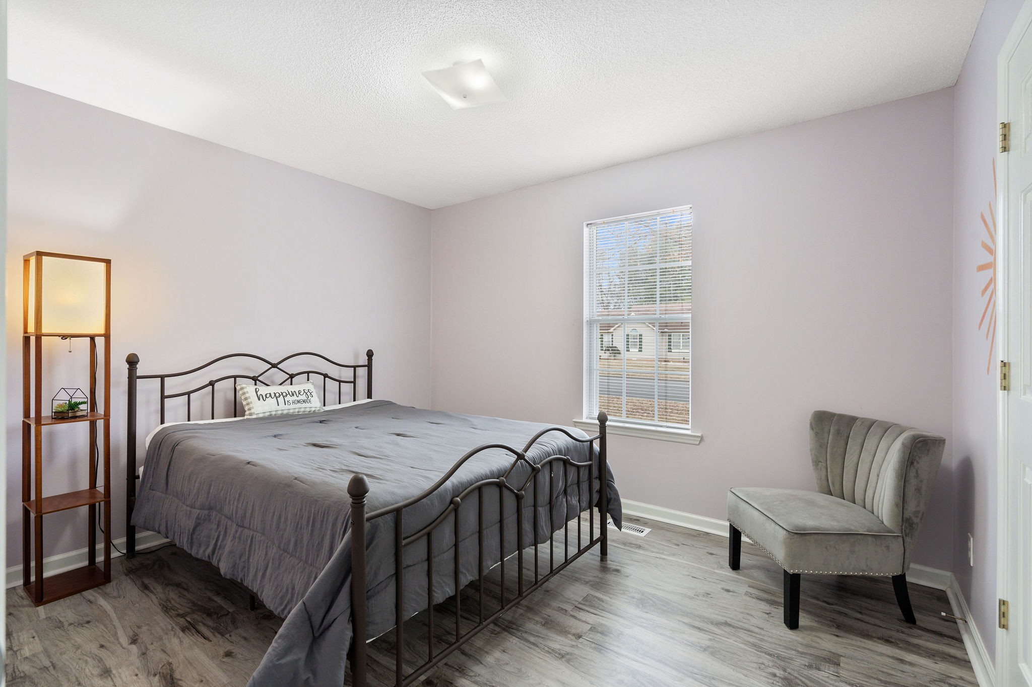 2335 Sawmill Street Murfreesboro, TN 37128 - Photo 22 of 34 a bedroom with a bed a couch and dresser