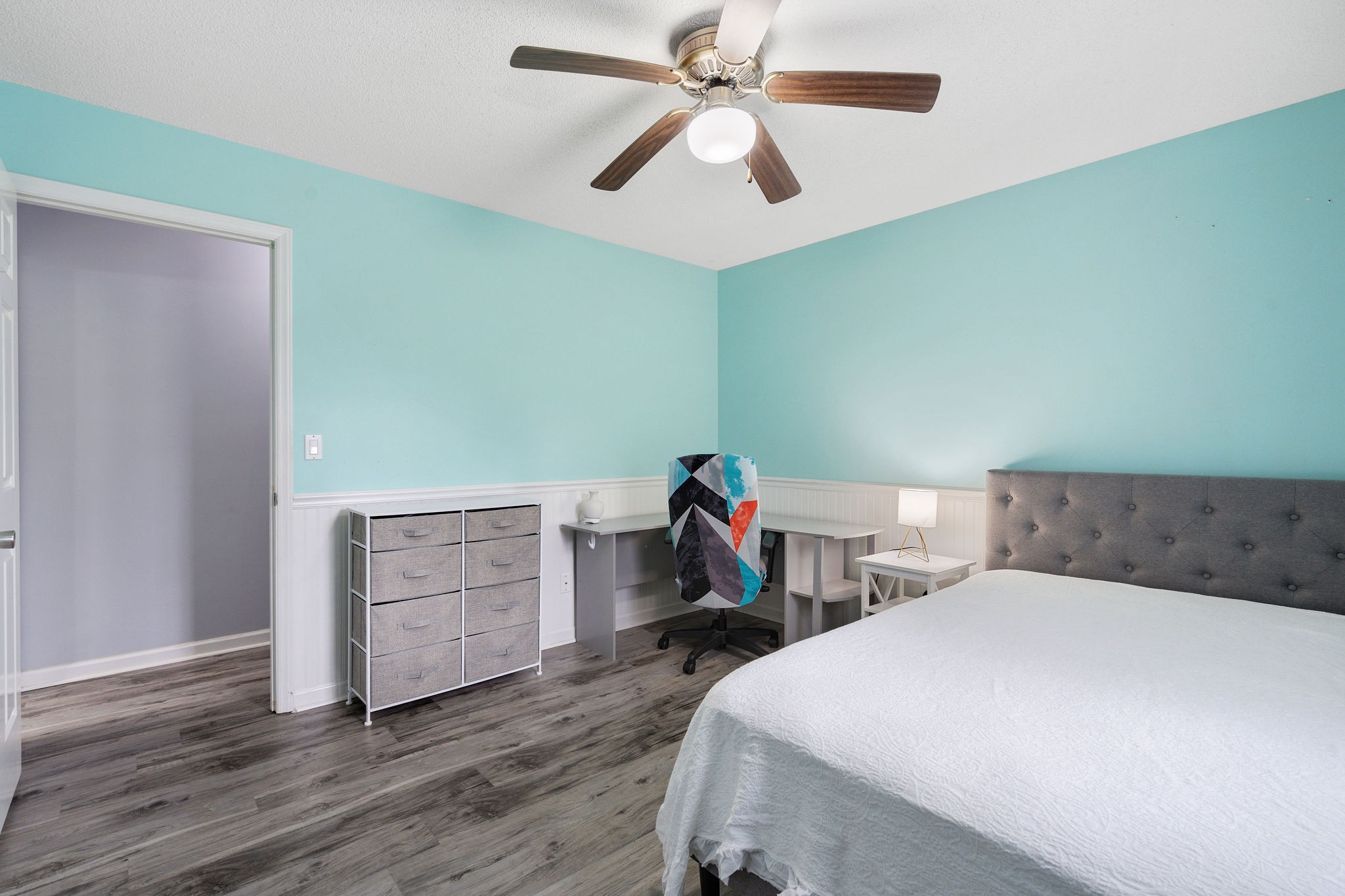 2335 Sawmill Street Murfreesboro, TN 37128 - Photo 25 of 34 a bedroom with a bed and a chandelier