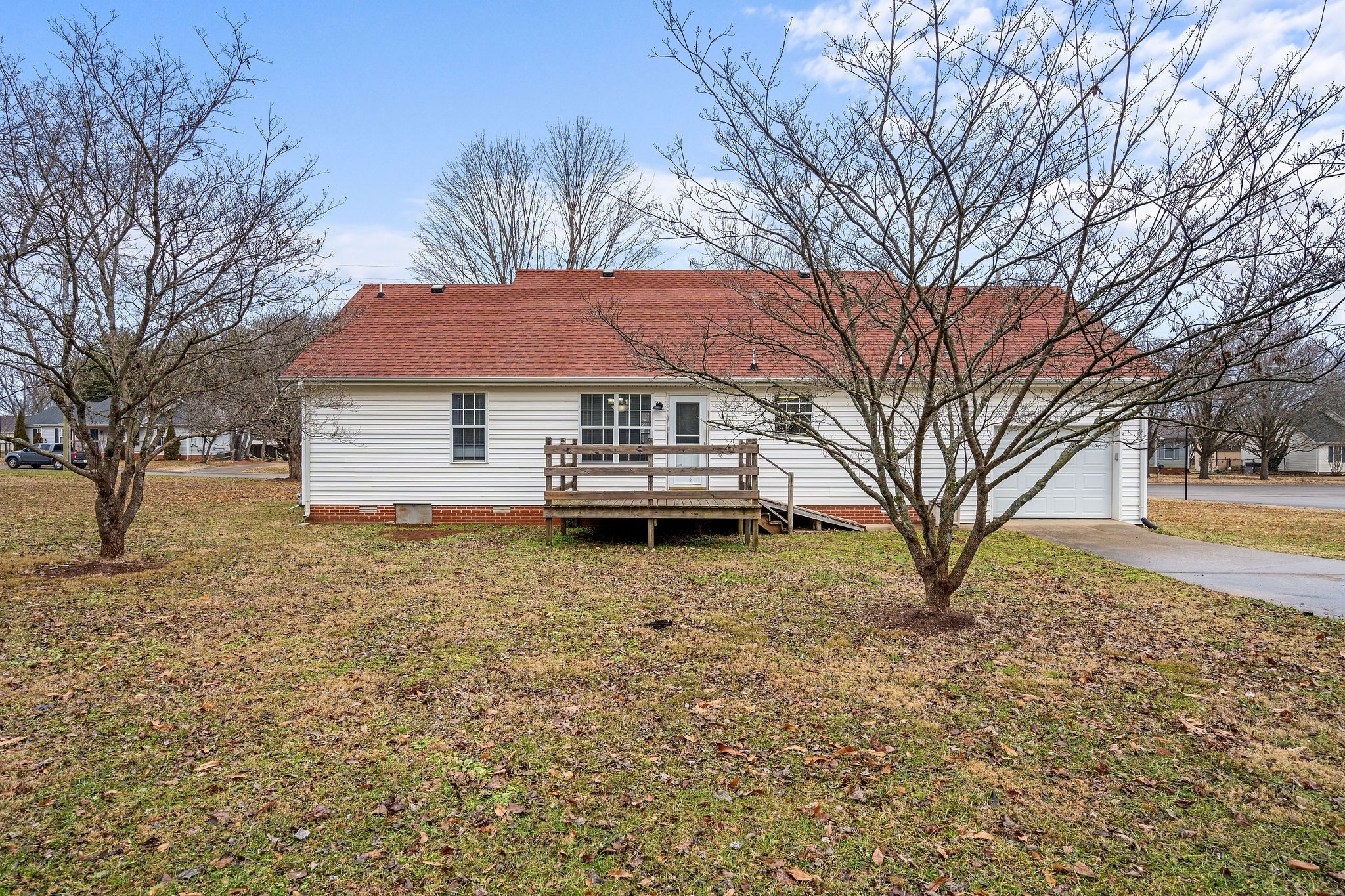 2335 Sawmill Street Murfreesboro, TN 37128 - Photo 27 of 34 a house that has a tree in front of it