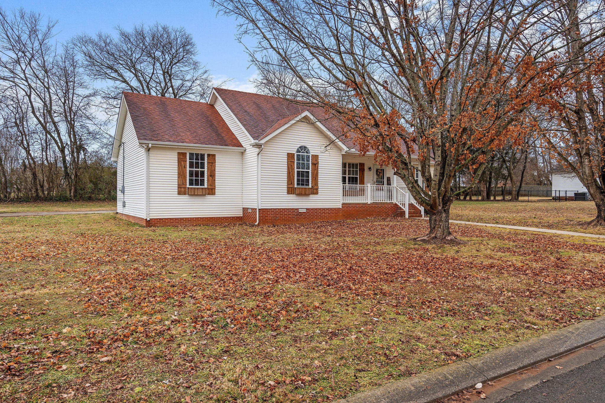 2335 Sawmill Street Murfreesboro, TN 37128 - Photo 4 of 34 a front view of house with yard and trees