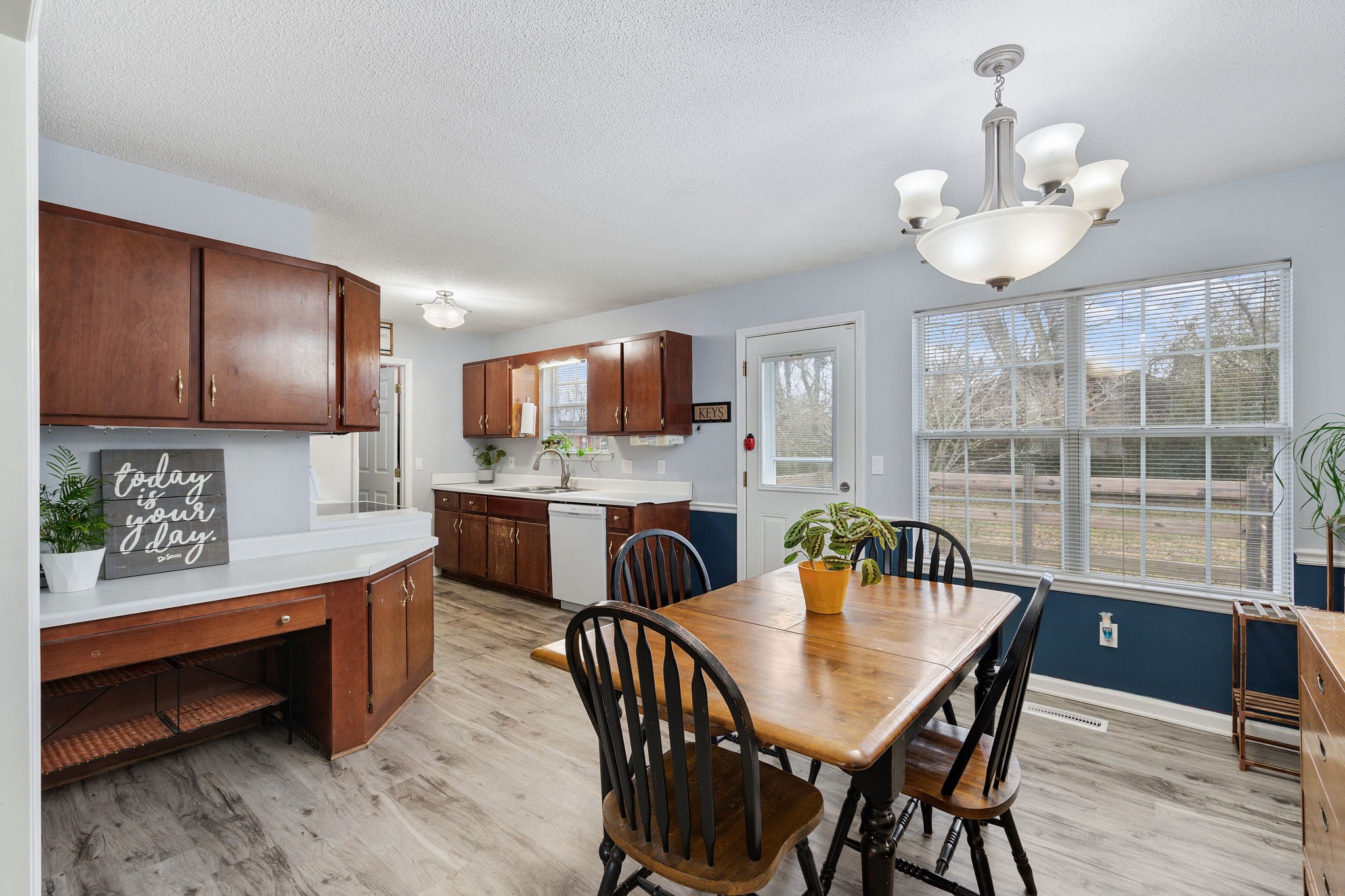 2335 Sawmill Street Murfreesboro, TN 37128 - Photo 10 of 34 a view of a dining room with furniture and wooden floor