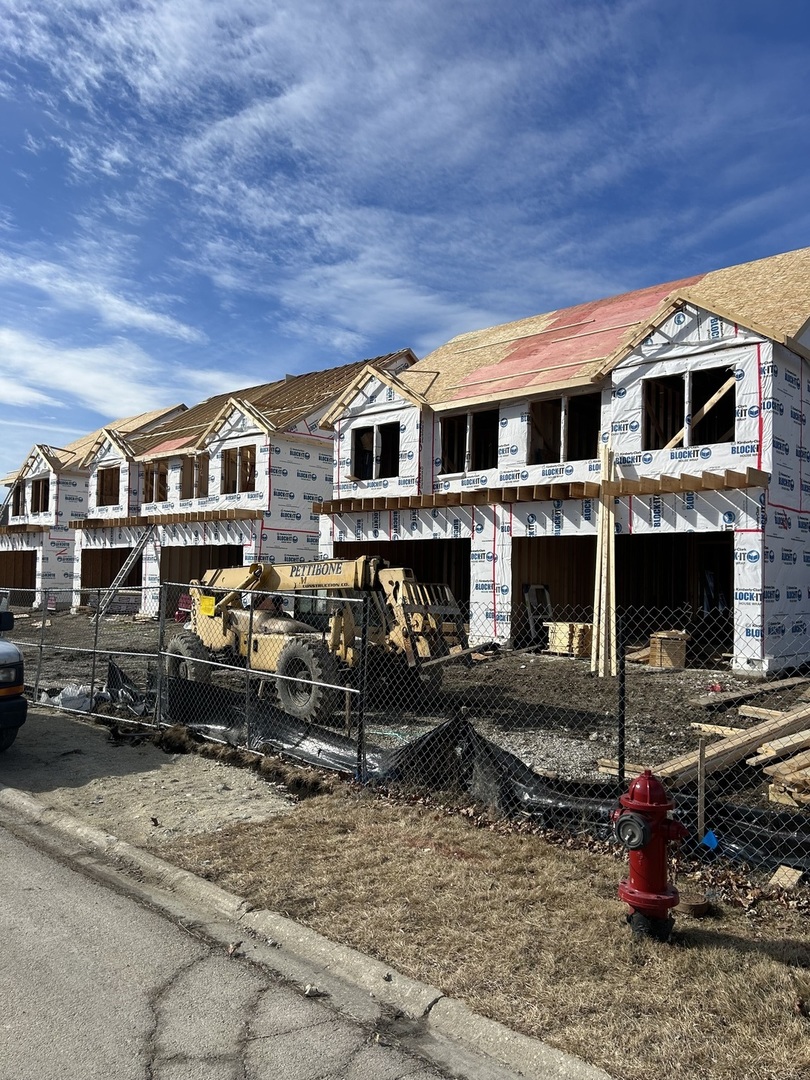 2021 Princess Court Lockport, IL 60441 - Photo 10 of 13 a front view of a house with a garage