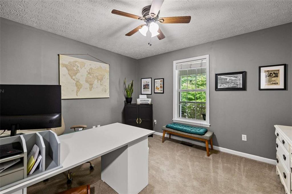 128 Byrom Road Senoia, GA 30276 - Photo 46 of 83 a room with furniture and window