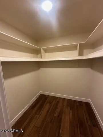 a view of a room with wooden floor and utility