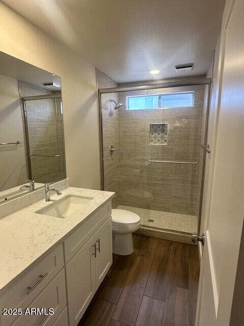 4213 East Mandan Street Phoenix, AZ 85044 - Photo 9 of 16 a spacious bathroom with a granite countertop sink toilet and shower