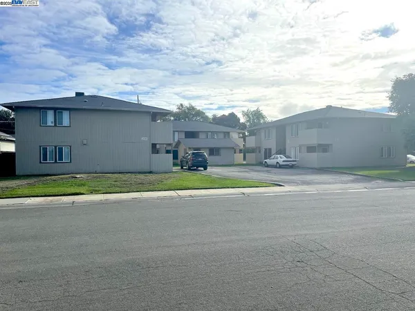 a view of the house with a swimming pool