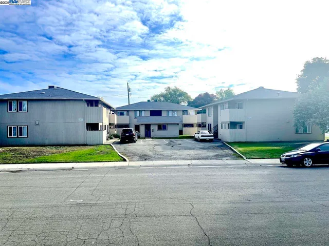 a house view with a garden space