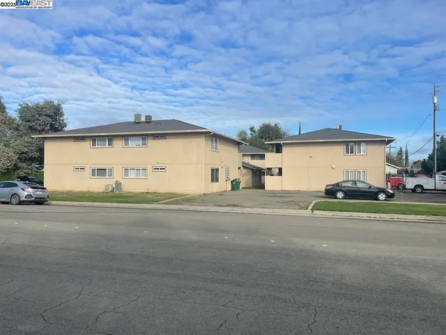 front view of a house with a street
