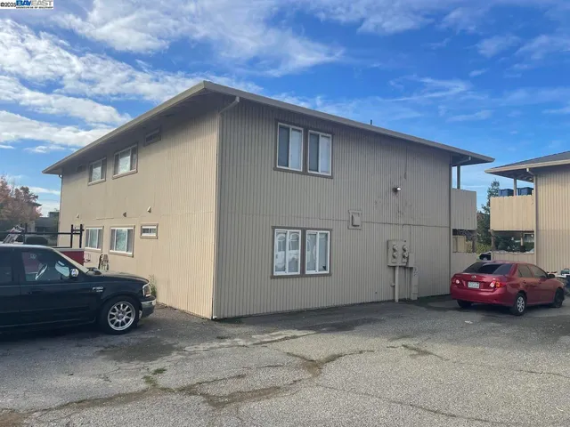 a car parked in front of a house