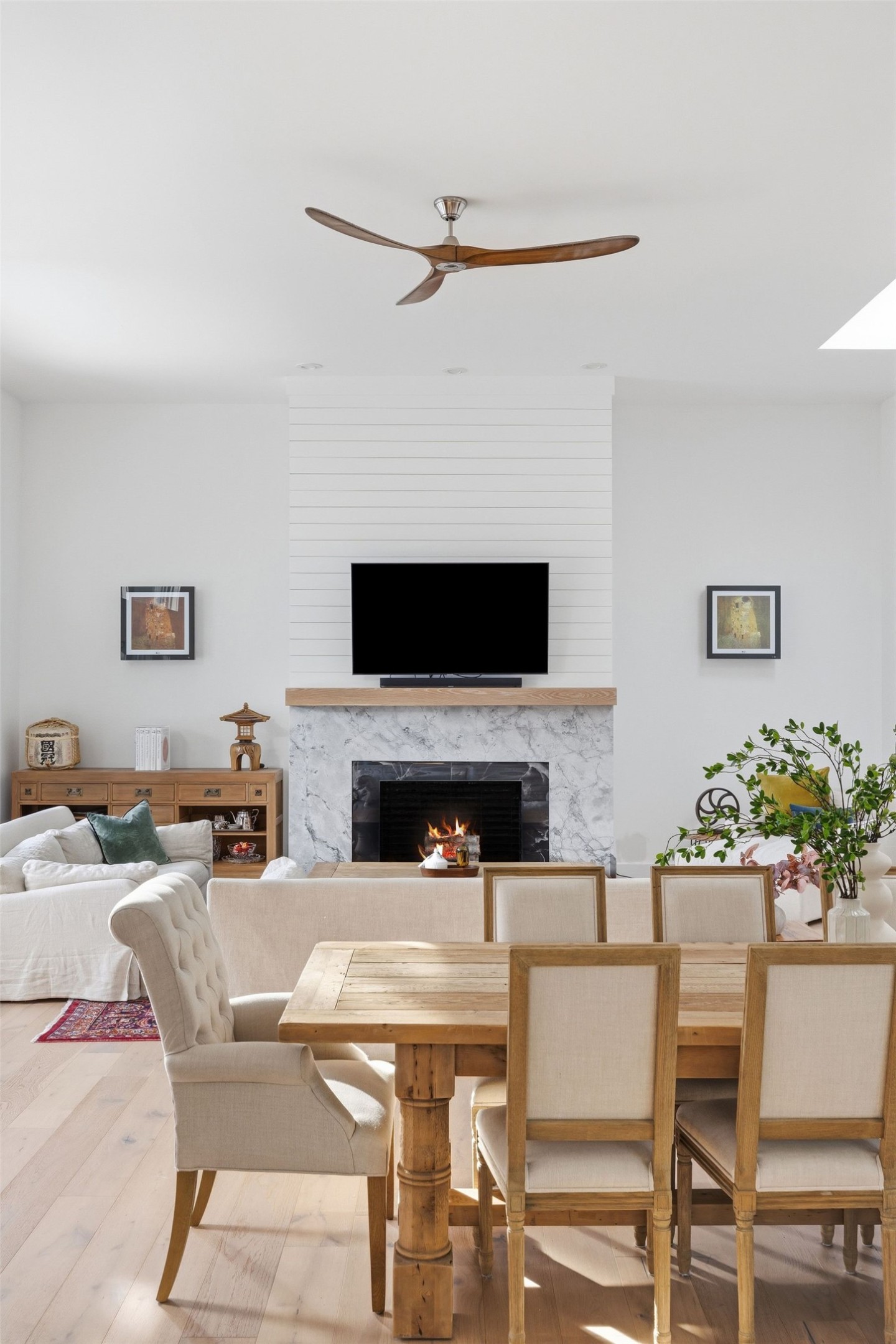 3508 Bridle Path Austin, TX 78703 - Photo 15 of 40 a living room with furniture a fireplace and a flat screen tv