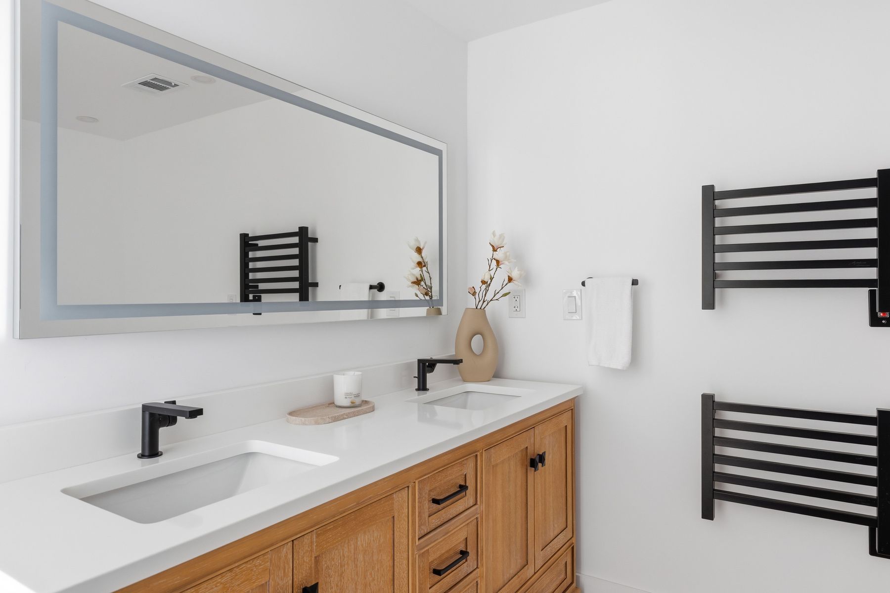 3508 Bridle Path Austin, TX 78703 - Photo 27 of 40 a bathroom with a sink double vanity and a mirror