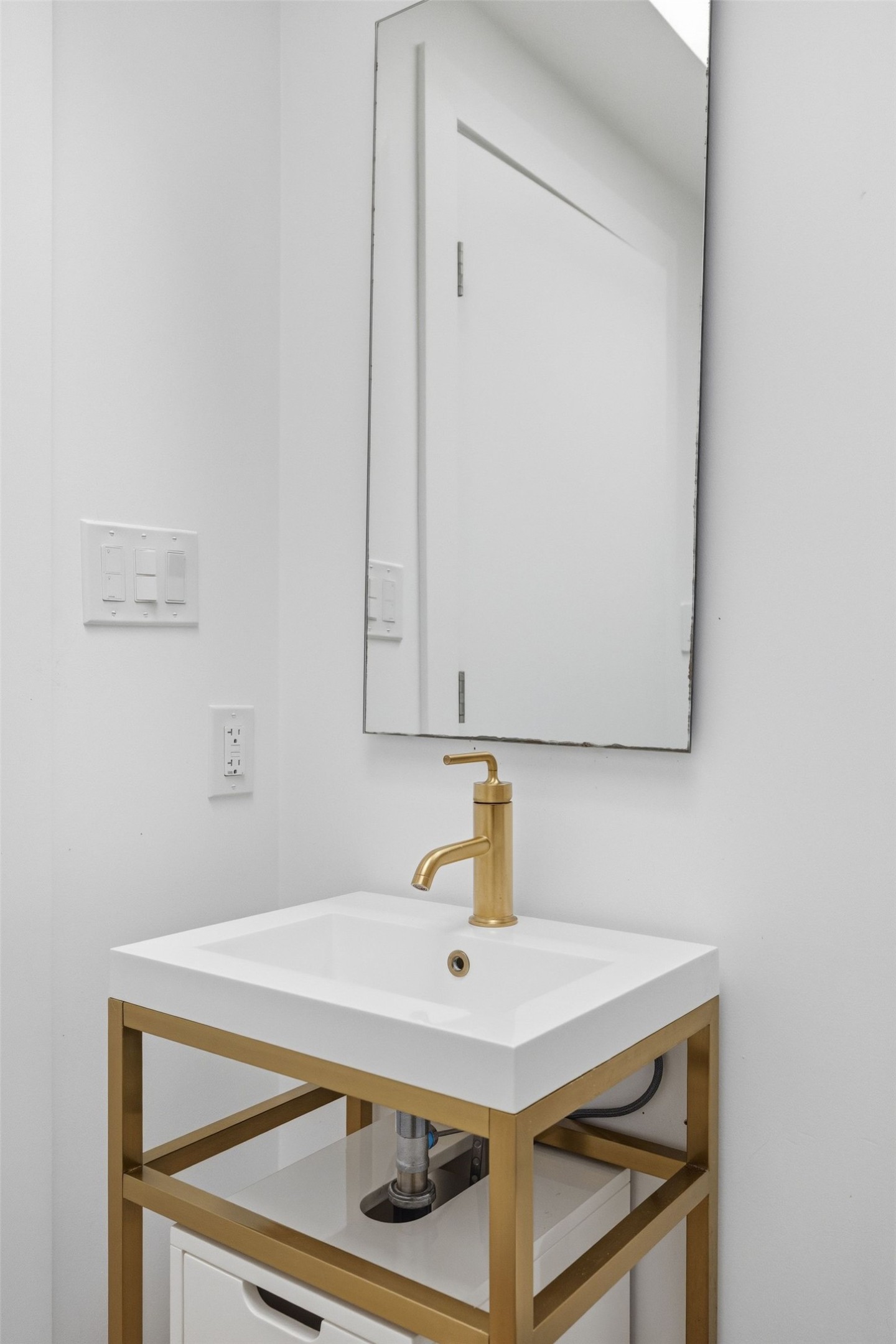 3508 Bridle Path Austin, TX 78703 - Photo 32 of 40 a bathroom with a sink and a mirror
