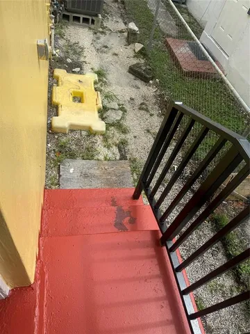 a backyard of a house with seating space